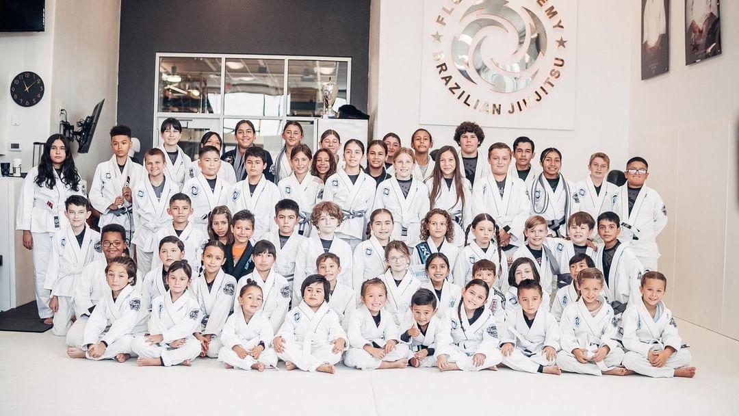 Flow Academy kids from every location together on the mat